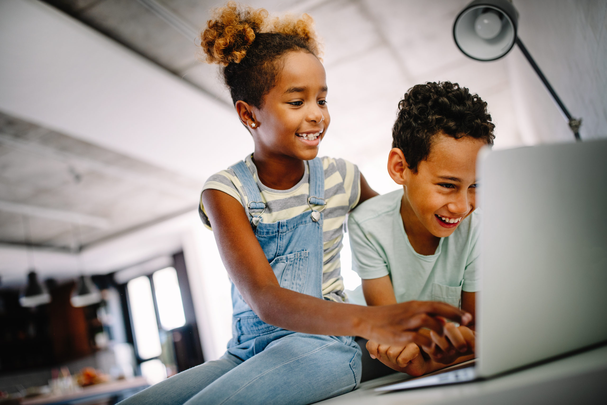 Children of technology. Online School Kid. KIDPASS. Happy child on Laptop. Forum distance-Learning.